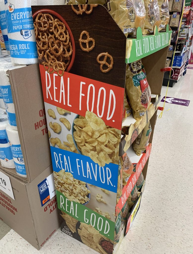 Supermarket shelf with snacks