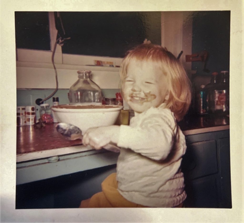 Patricia as a child with chocolate on her face