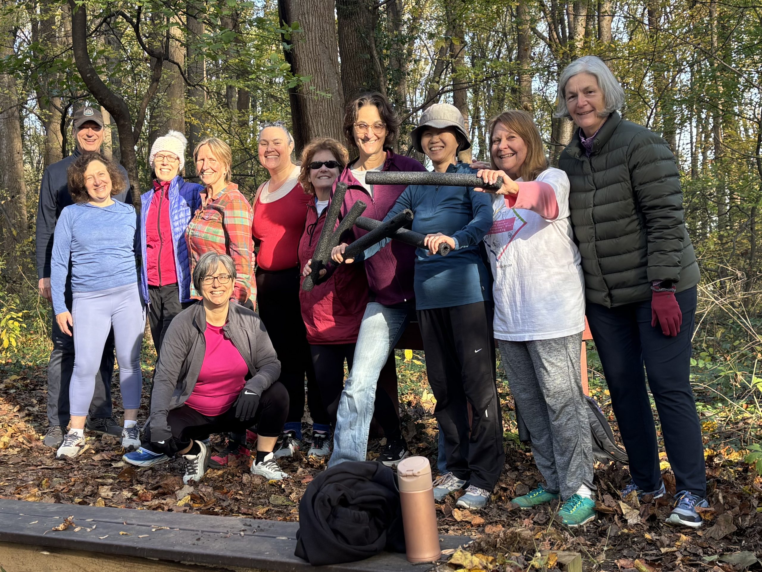 Happy women in the woods after a workout